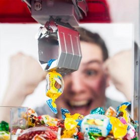 Candy machine dispensers at home for catching (grab) sweets