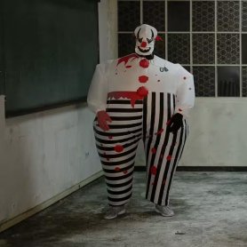 Halloween jelmez - felfújható ijesztő bohóc (Jester) felnőtteknek ventilátorral