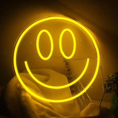 Smile - LED neon logo light advertisement shining on the wall Smiley