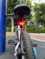 Lampka tylna do roweru z kierunkowskazami bezprzewodowo z 32 diodami LED + efekt dźwiękowy 120 dB