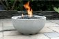 Gas firepit on the outdoor terrace - gas fireplace (gray hemisphere) - circular design