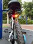 Luz trasera para bicicleta con intermitentes de forma inalámbrica con 32 LEDs + efecto de sonido 120 dB