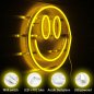 Smile - LED neon logo light advertisement shining on the wall Smiley